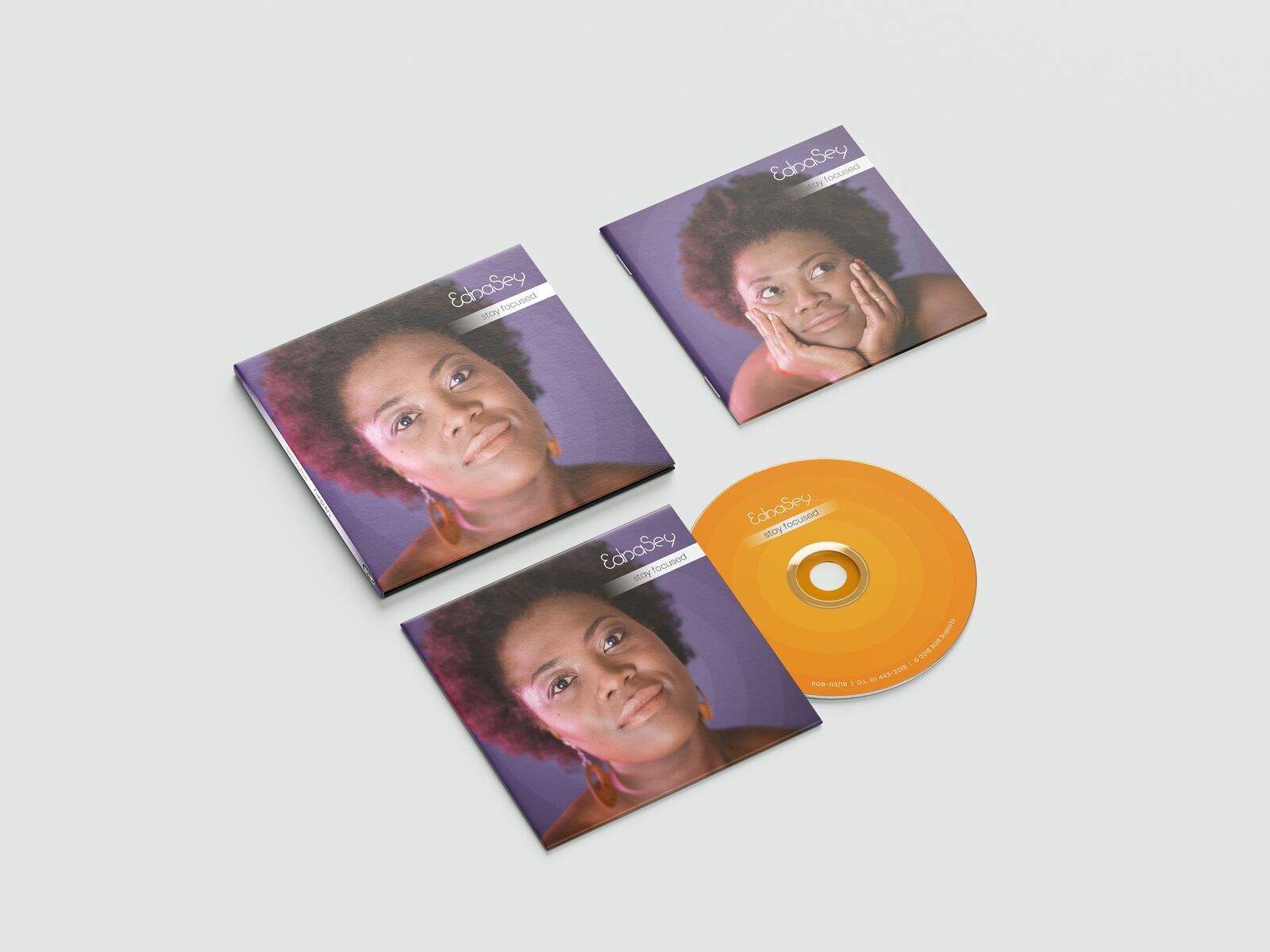 Complete case for Edna Sey's album “Stay Focused”, with the cover, disc and booklet laid out