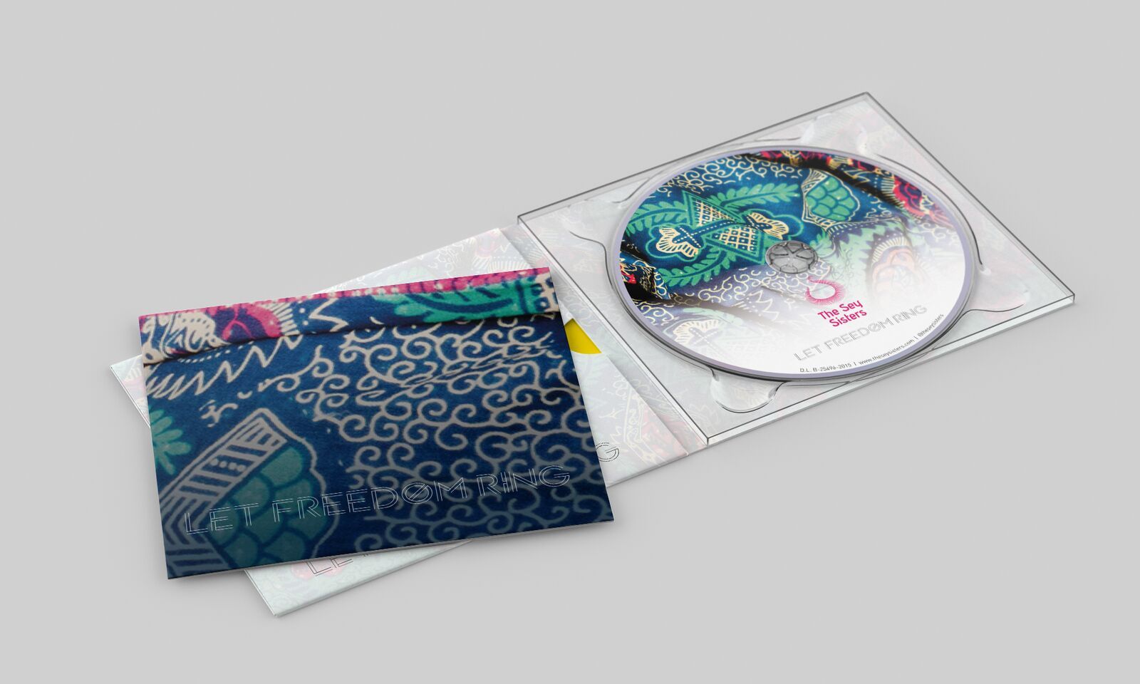 Case and disc of The Sey Sisters' album “Let Freedom Ring”, with the textile print from the cover