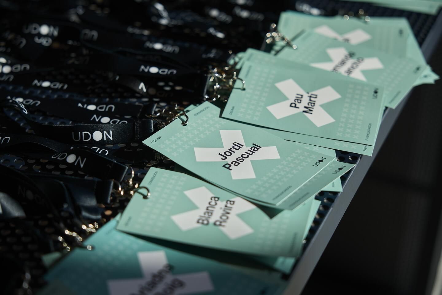 Personalised badges with each franchisee's name and the convention graphics